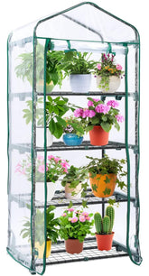 Ohuhu mini greenhouse outdoors with clear cover boosts seedling warmth and light