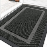 OLANLY front door mat with rubber back glides under doors and traps dirt