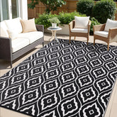 OLANLY outdoor rug with geometric black-and-white pattern, durable for patios and decks.