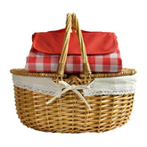 OrgaNatureQueen wicker picnic basket with blanket ready for outdoor dining.