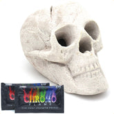 OSKER Fire Pit Skull with color-changing packets for vibrant flame color during gatherings.