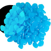 OSOPOLA blue glow stones illuminate an aquarium with soft ambient light.