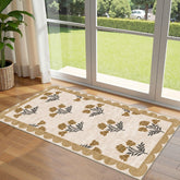 Othilic front door mat with scalloped edge enhances entryway aesthetics.