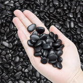 OUPENG black pebbles close-up showing smooth surface for decor
