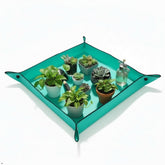 Owl Focus repotting mat folded compact for space-saving storage.