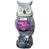 Owlsome solar snowy owl with flashing eyes enhances garden ambience and deters pests