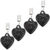 OwnMy cast iron heart clip set secures tablecloths against wind for outdoor dining.