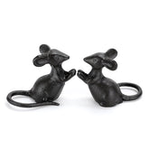 OwnMy two cast-iron mice figurines add rustic charm to indoor shelves.