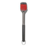 OXO Good Grips grill brush head close-up showing durable nylon bristles for cold cleaning