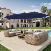 Patio Kingdom 15ft double-sided umbrella with base included offering expansive shade.