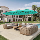 Patio Kingdom 15ft double-sided turquoise umbrella with base included provides expansive shade.