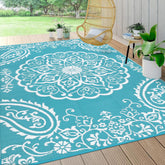 Pauwer outdoor rug 10x14 floral front view adds charm and weatherproof durability