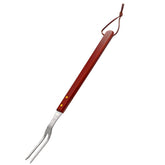 PEPKICN two-tine stainless steel carving fork for steady meat lifting.