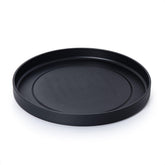 Phoenix Vine 14-inch plastic plant saucer in matte black for tidy indoor use.