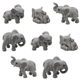 Pinenjoy elephant figurine with lowered head for serene desk decor and charm.