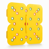 Plant & Plot seedling spacer tool guiding precise seed placement in a tidy grid