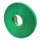 Plantactic Garden Tie green tape 16.4ft securing a climbing plant and supporting growth.