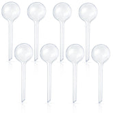 Pynqdfu clear watering globes showing water level for easy indoor plant care.