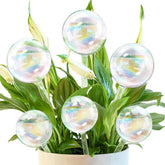 Pynqdfu iridescent glass watering ball large keeps indoor plants hydrated with steady water release.