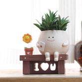 QIAOLY smiley-face planter for cheerful indoor decor and small succulents