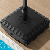 QNCZ patio umbrella base with wheels for easy shade placement.