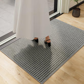 QQL doormat indoor-outdoor white and gray traps dirt at the doorway.