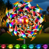 Qualdout solar wind spinner with four-tier blades delivering vibrant 360° motion in any garden breeze.