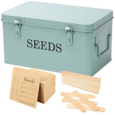 QUILIVIK seed storage box with green rectangular lid keeps packets organized.