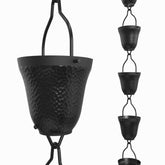 Rain Chains Direct Contempo rain chain in black adds curb appeal to gutters.