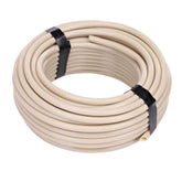 Raindrip R252DT 50 ft tubing coil for steady drip irrigation in garden beds.