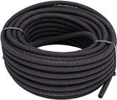 Raindrip soaker hose 50ft in garden delivers gentle soil hydration for vegetables