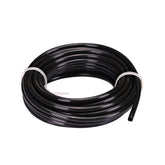 Raindrip 1/4-inch tubing coil for drip irrigation waters trees and beds.