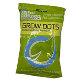 Real Growers Grow Dots Extended bottle pour shows controlled feeding for coco coir setups