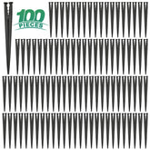 RedChili 100-pack drip stake on ground secures 1/4-inch tubing for tidy irrigation.