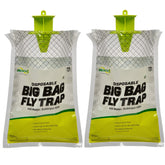 RESCUE! Big Bag Fly Trap outdoors near a barn for effective fly control.