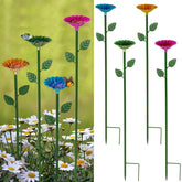Retyion bee watering station with red flower design attracts pollinators in sunny gardens.