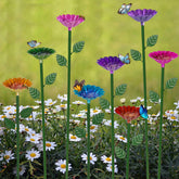Retyion bee watering station with flower design attracts pollinators in the garden.