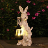 REYISO solar garden statue bunny lights illuminate outdoor spaces with energy-efficient glow