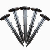 Rinteria 50-pack stakes with 4.3-inch tips securing weed barrier fabric.