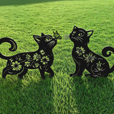 Rioneta cat garden stake left cat adds playful yard charm.