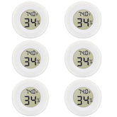 Rojuna mini round hygrometer with LCD display for quick indoor climate readings.