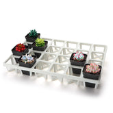 RooTrimmer 5-Pack pot move tray shows 24-cell layout for transporting square nursery pots.