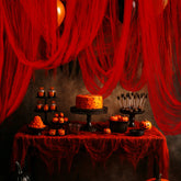 RunNico blood red gauze creates a dramatic Halloween porch backdrop