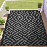 Rurality outdoor rug 9x12 on patio shows weather resistance and UV protection.