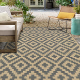 SAND MINE reversible mats in grey and tan on patio, durable for outdoor gatherings