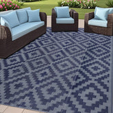 SAND MINE Reversible Mats on a blue-grey lattice patio, durable and easy to clean