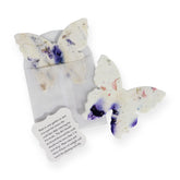 Seed Bloom butterfly seed paper set with 24 purple papers ready to plant.