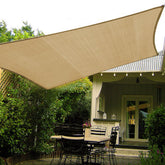 Shade&Beyond 10x10 sun shade sail with curved edge in sand offers stylish sun protection.
