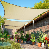 ShadeMart 14x14 beige shade sail front view showing wide coverage for sunny patios
