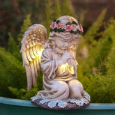 Sharita praying angels figurine glows with solar power for garden serenity